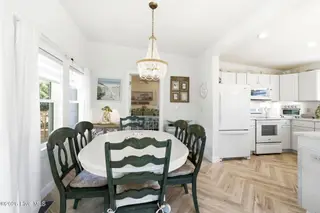3929 W Dolphin Drive, Oak Island, NC 28465 – photo 9: shniderproductions.com-25