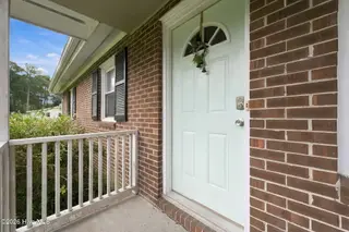 811 Little John Avenue, Jacksonville, NC 28546 — 3-bedroom home in Sherwood Forest, Jacksonville, NC, photo 2 of 24: Front Door