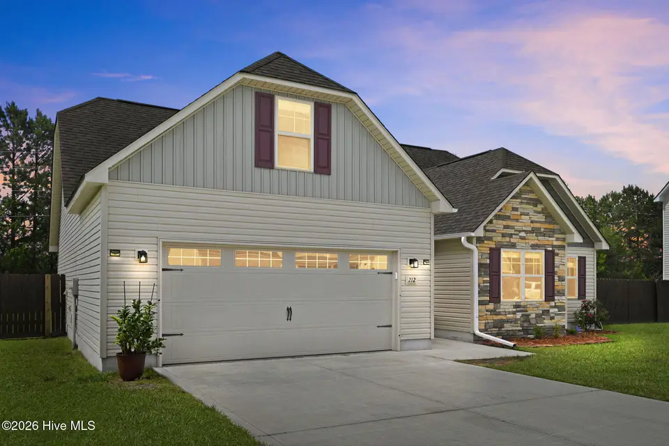 212 Holly Grove Court E, Jacksonville, NC 28540 – photo 1 of 51: 1-web-or-mls-Virtual Dusk_2