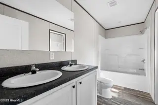 6795 Lewis Drive SE, Winnabow, NC 28479 – photo 20: Master bathroom