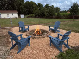 2103 Hilltop Lane, Goldsboro, NC 27530 – photo 6: Fire pit virtually staged