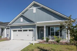 77 Bristol Bay Drive, Lake Waccamaw, NC 28450 – photo 1: Isla Architectural Style