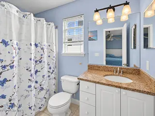 121 NE 6th Street, Oak Island, NC 28465 – photo 13: Bath