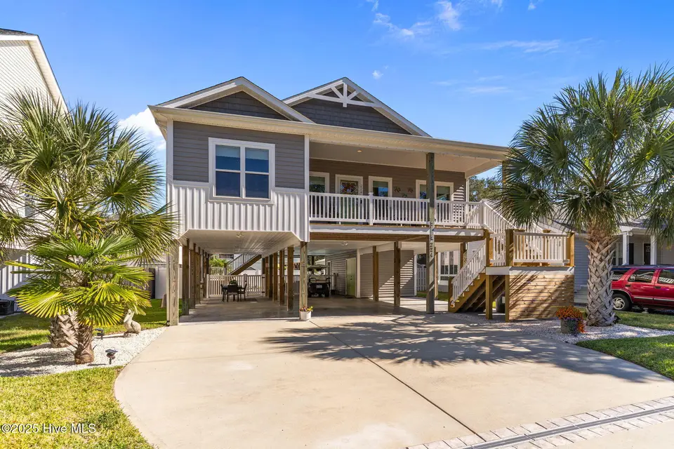224 NE 58th Street, Oak Island, NC 28465 – photo 1 of 55: 3-web-or-mls-BTS00238