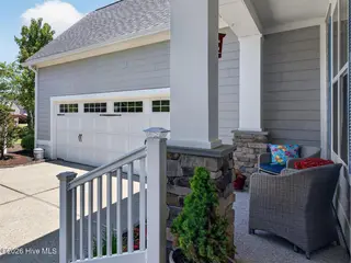 4221 Skeffington Court, Southport, NC 28461 – photo 11: Courtyard Entry Two Car Garage