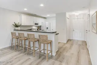 1620 Goley Hewett Road SE Unit 407, Bolivia, NC 28422 — 2-bedroom condo in Winding River Plantation, Bolivia, NC, photo 23 of 73: Vstaged - Bar