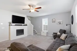4164 Pegasus Parkway, Leland, NC 28451 – photo 6: custom fireplace and mantle