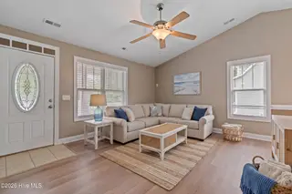 473 Pine Lake Road, Southport, NC 28461 — 4-bedroom home in Boiling Spring Lakes, Southport, NC, photo 6 of 39: Photo 8 living room AI