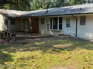 32 Dogwood Lane, Whiteville, NC 28472 – photo 8: Patio in Back of home