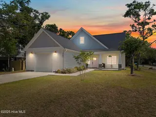 2101 E Oak Island Drive, Oak Island, NC 28465 – photo 1: 05-www.kahunaphoto.com-DJI_2025071216184