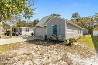 152 NW 10th Street, Oak Island, NC 28465 – photo 3: 50-web-or-mls-DSC09418