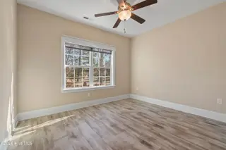 123 Bellwood Circle, Sunset Beach, NC 28468 – photo 24: Guest bedroom 1