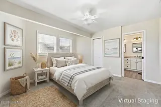 1426 N New River Drive, Surf City, NC 28445 – photo 21: Master Bedroom Virtually Staged