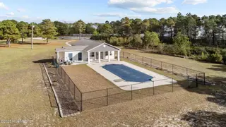 404 Inverness Drive, Hubert, NC 28539 – photo 9: 51-web-or-mls-DJI_20241111141749_0583_D
