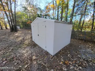 119 Edgewater Lane, Richlands, NC 28574 — 2-bedroom manufactured home in Chapel Ridge, Richlands, NC, photo 9 of 34: Storage Shed