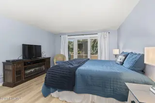 331 Salter Path Road 104 Beachwalk, Pine Knoll Shores, NC 28512 – photo 4: Large primary bedroom suite