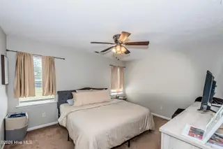 126 Forest Bluff Drive, Jacksonville, NC 28540 — 3-bedroom home in River Hills, Jacksonville, NC, photo 10 of 22: Primary Bedroom