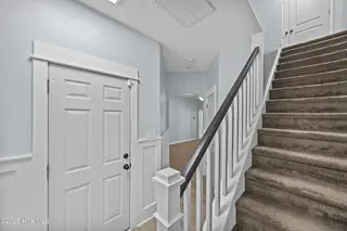 323 Cedar Island Trail, Holly Ridge, NC 28445 — 3-bedroom townhome in The Landing At Folkstone, Holly Ridge, NC, photo 17 of 36: 21_stairs