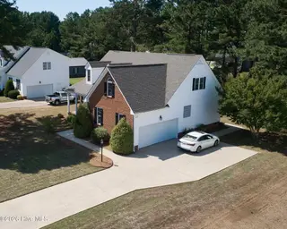 4530 Dewfield Drive N, Wilson, NC 27896 – photo 6: 4530 Dewfield - Drone front right