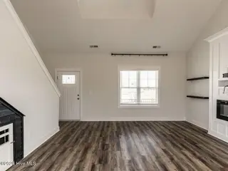 38 Muscadine Way, Smithfield, NC 27577 – photo 7: 008-1280x960-family-room-with-fireplace