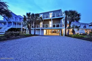 6008 W Beach Drive, Oak Island, NC 28465 – photo 2: 6008WestBeachDrive_twilight-1
