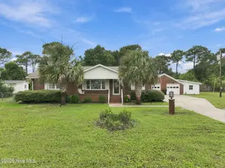 123 Willis Drive, Harkers Island, NC 28531 — 2-bedroom home, Harkers Island, NC, photo 1 of 34: Front Exterior