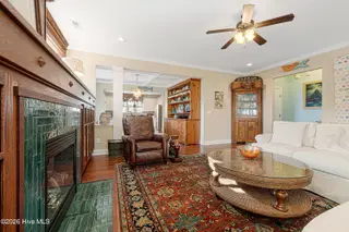 301 Hedrick Street, Beaufort, NC 28516 – photo 10: Living room with gorgeous fireplace