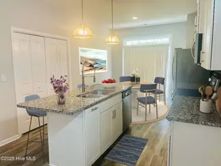 702 Pirates Landing Drive, Beaufort, NC 28516 – photo 14: Virtually Staged Kitchen/Dining Combo