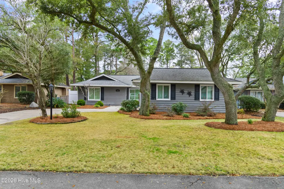 606 Camellia Lane, Sunset Beach, NC 28468 – photo 1 of 61: Front of home