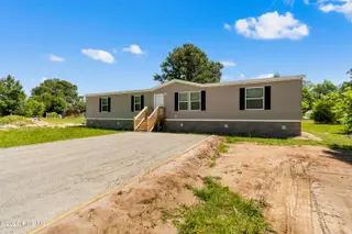 490 Orchard Lane SE, Bolivia, NC 28422 — 3-bedroom manufactured home in Vineyard Plantation, Bolivia, NC, photo 2 of 27: 490 Orchard