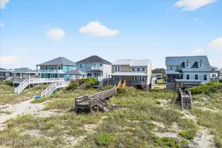 2221 E Beach Drive, Oak Island, NC 28465 – photo 1: 910-269-3334