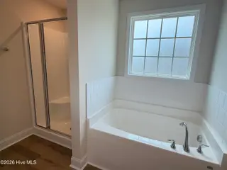 511 Country Club Villa Drive, Shallotte, NC 28470 – photo 14: 511 Country Club Primary Suite Bath