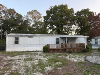 1321 Caison Avenue SW, Supply, NC 28462 — 2-bedroom manufactured home in Holiday Acres, Supply, NC, photo 1 of 24