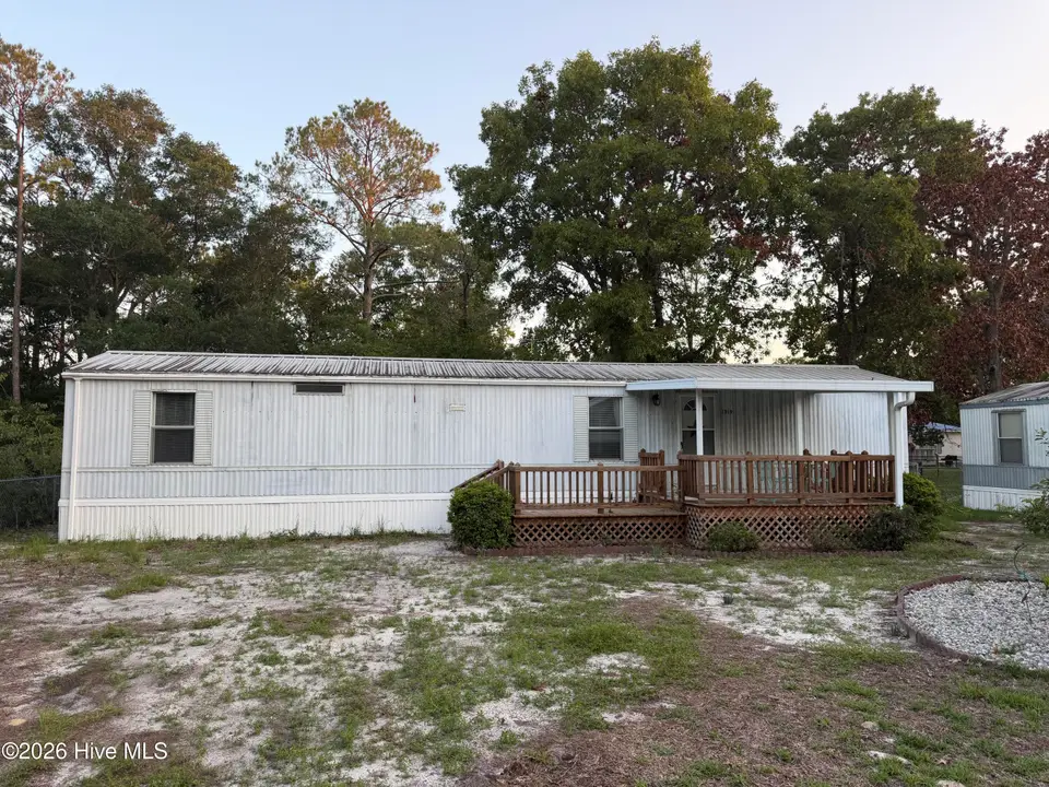 1321 Caison Avenue SW, Supply, NC 28462 — 2-bedroom manufactured home in Holiday Acres, Supply, NC, photo 1 of 24
