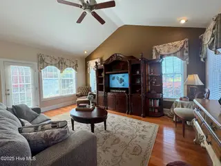 25 Muirfield Drive, Whiteville, NC 28472 – photo 23: Family room with vaulted ceilings