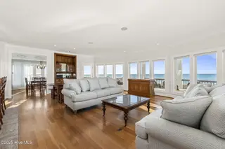 3107 Ocean Drive, Emerald Isle, NC 28594 – photo 15: Open living room w/ fireplace