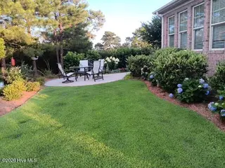 4296 Skeffington Court, Southport, NC 28461 – photo 22: back yard patio
