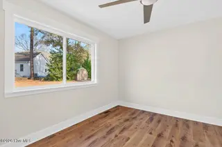 501 Shoreline Drive E, Sunset Beach, NC 28468 – photo 19: Second bedroom on main floor