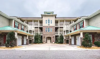 7825 High Market Street 304, Sunset Beach, NC 28468 — 3-bedroom condo in Village Park, Sunset Beach, NC, photo 1 of 36: Front