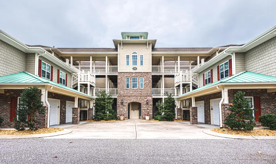 7825 High Market Street 304, Sunset Beach, NC 28468 — 3-bedroom condo in Village Park, Sunset Beach, NC, photo 1 of 36: Front