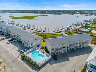 1405 Canal Drive Apt 17, Carolina Beach, NC 28428 – photo 1: 45-web-or-mls-1405 Canal Dr #17-47 copy