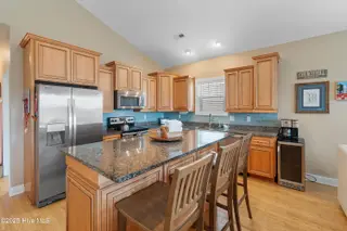 1634 E Dolphin Drive, Oak Island, NC 28465 – photo 19: 1634EDolphinDr - 28