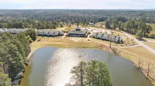 490 Little River Farm Boulevard 101a, Carthage, NC 28327 – photo 6: Drone overview all buildings from roadsi