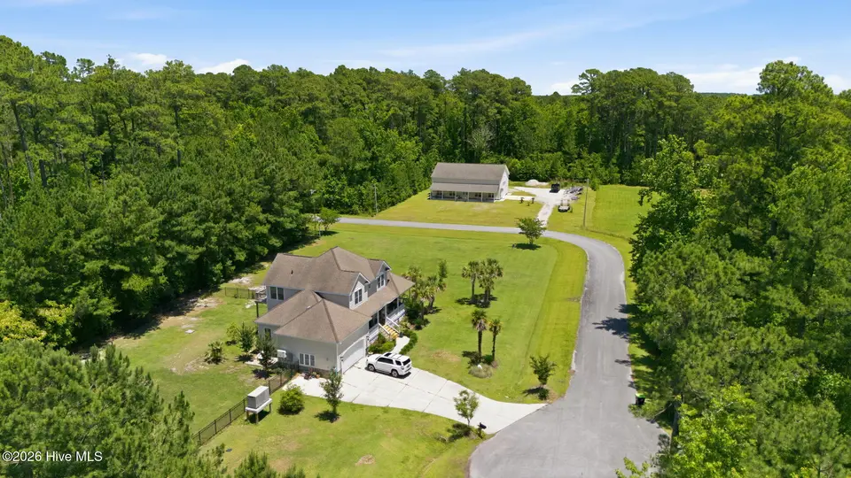 108 Blue Heron Court, Beaufort, NC 28516 — 3-bedroom home in Sea Gate, Beaufort, NC, photo 1 of 70: 11-web-or-mls-DJI_20260603131831_0405_D