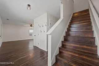 122 Tanbark Drive, Jacksonville, NC 28546 — 3-bedroom home in Aragona Village, Jacksonville, NC, photo 19 of 53: Stairs to the 2nd Story