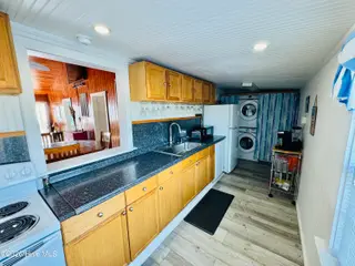 4021 E Beach Drive, Oak Island, NC 28465 – photo 12: IMG_2352