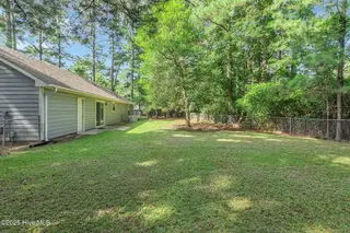 821 Shadowridge Road, Jacksonville, NC 28546 – photo 24: 821 shadowridge back yard