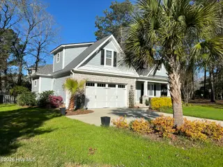 909 Oyster Pointe Drive, Sunset Beach, NC 28468 – photo 2: IMG_5351