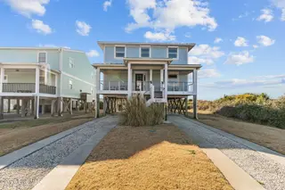 7403 E Beach Drive, Oak Island, NC 28465 – photo 2: Expansive Decking with Ocean Views