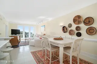 4425 Arendell Street 303 Harborside Club At 70 West, Morehead City, NC 28557 – photo 15: Dining area w/ wet bar